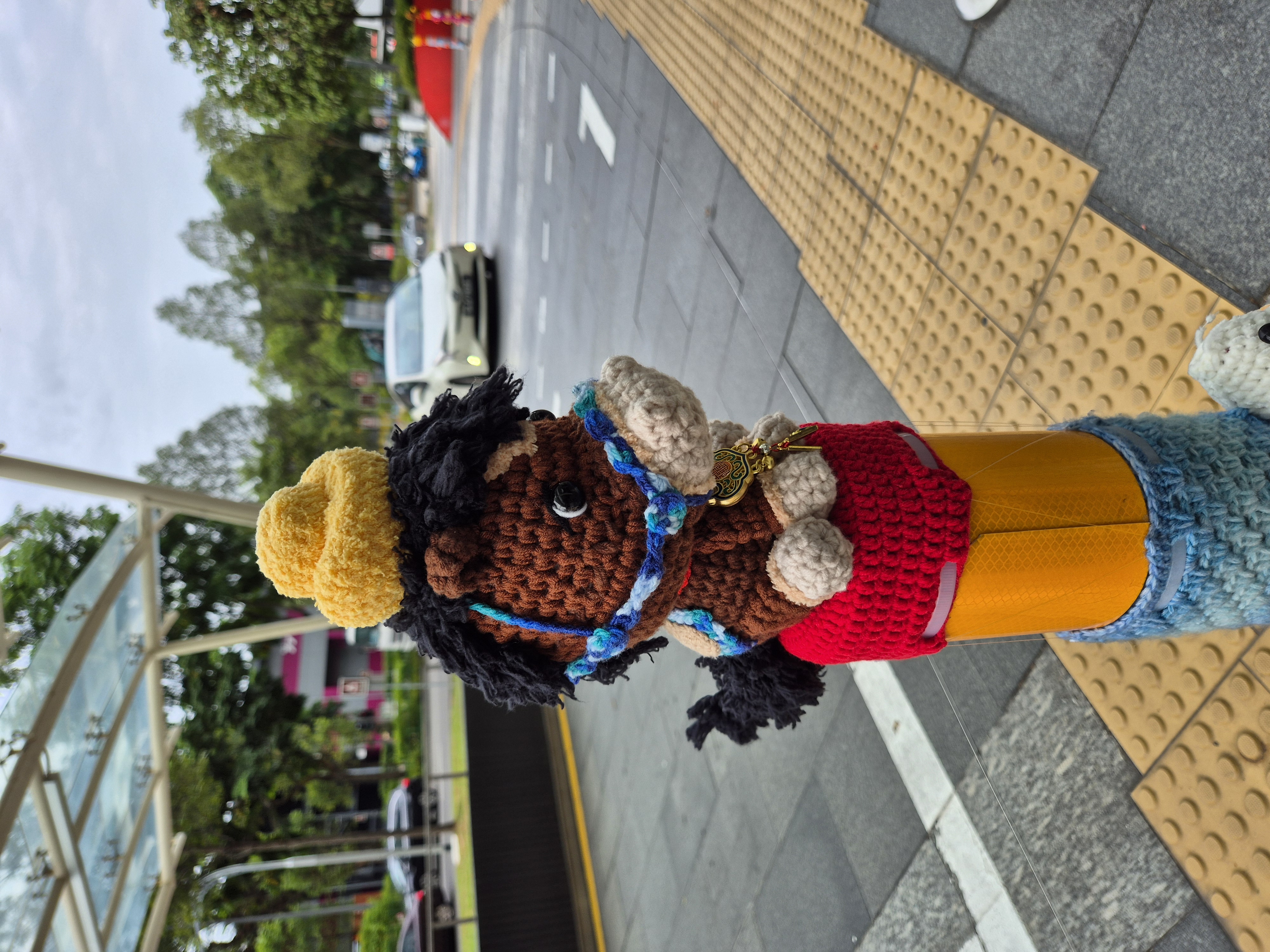 Crocheted horse from the CNY Toppers installation of 2026.